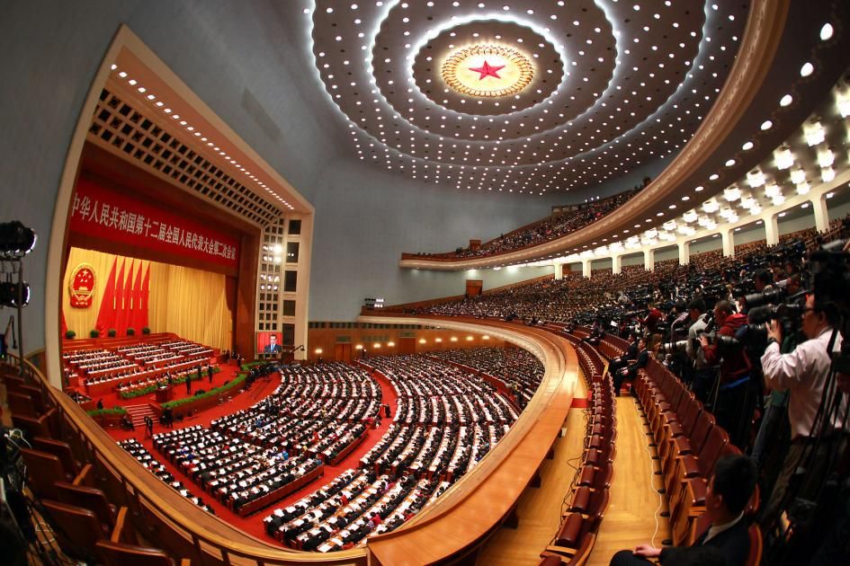 China s top leaders and delegates attend the opening of the National People s Congress NPC the country s annual parliament session in the Great Hall of the People in Beijing on March 5 2014 UPI Stephen Shaver 5Mar2014 UPI The National People s Congress Begins in Beijing - Photos by MERLION HM