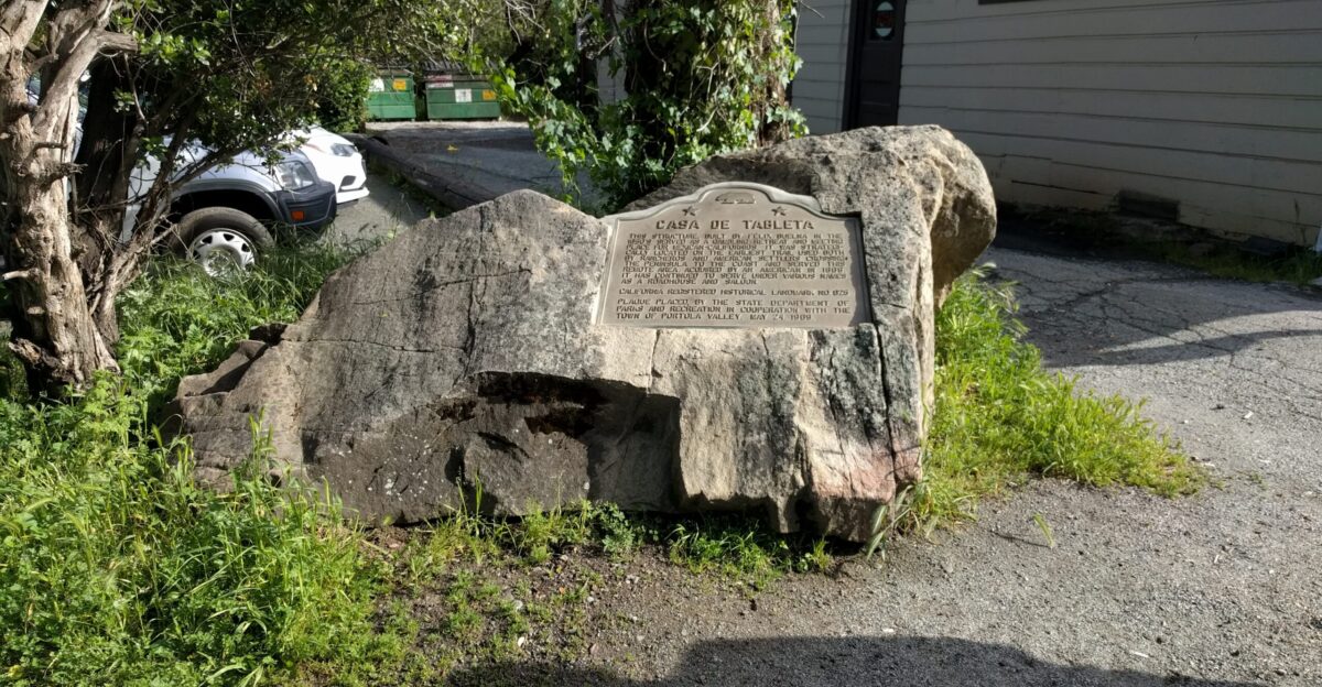 A wider view of a plaque next to the Alpine Inn Portola Valley California which describes its history