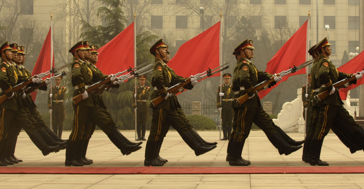 Members of a Chinese military honor guard march during a welcome ceremony for Chairman of the Joint Chiefs of Staff Marine Gen Peter Pace at the Ministry of Defense in Beijing China