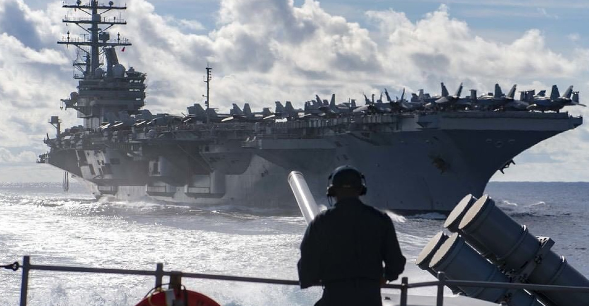 Repost By @usnavy #ForgedByTheSea  A #USNavy Sailor stands watch as aft lookout aboard the Ticonderoga-class guided-missile cruiser… by Charlie Bravo