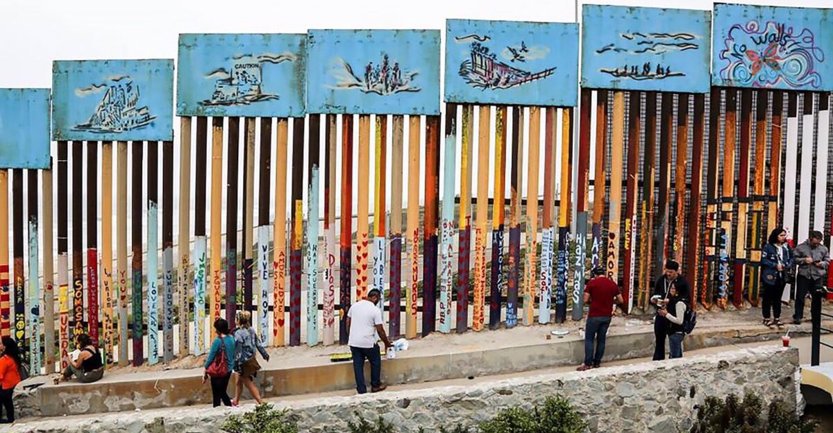 Artists are turning the U S -Mexico border fence into the world s longest peace-themed mural by CXA