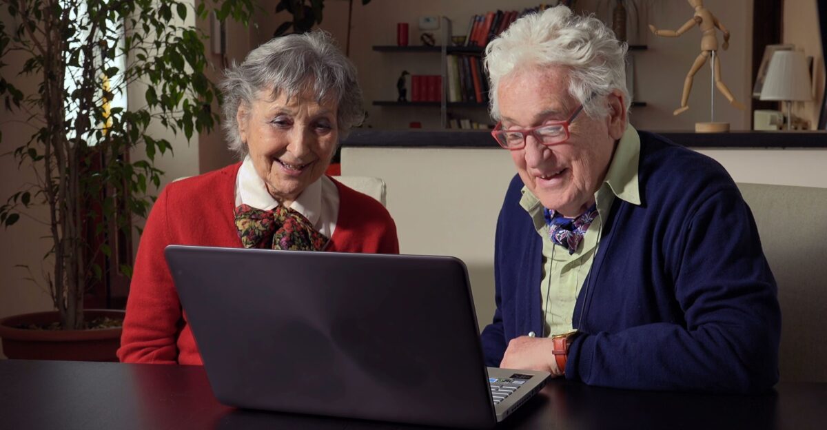 Old people and new technology old couple using laptop computer at home Stock Footage AD couple laptop people technology by Vasily
