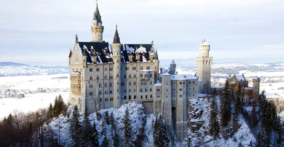 neuschwanstein castle bavaria architecture fortification hilltop snow trees snowy winter fortress scenery landscape mountain nature europe germany medieval