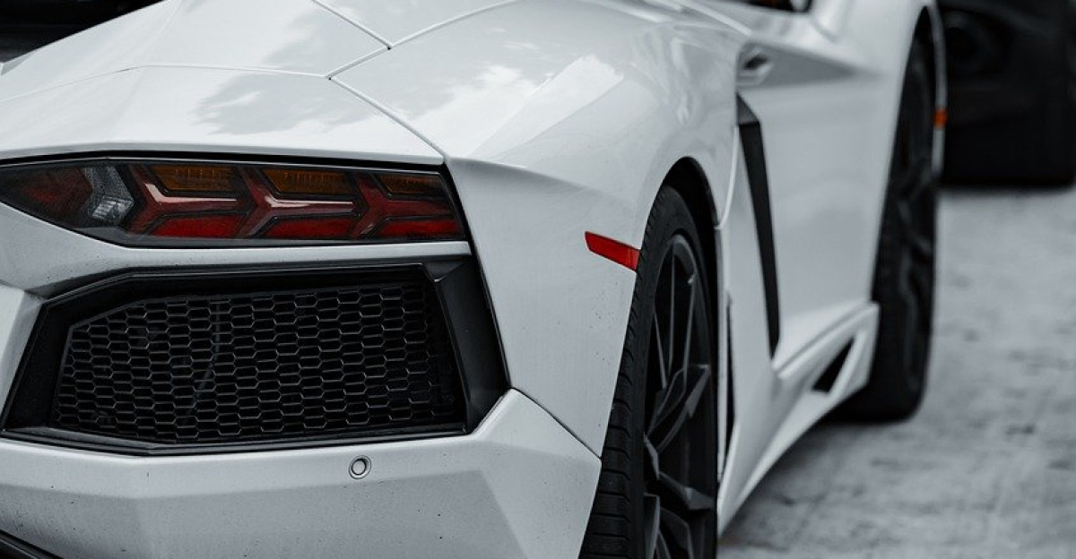 cars, super cars, luxury cars, lamborghini, corvette, black car, white car, sports cars, exotic cars, daytime, parked cars, car row, black lamborghini, white lamborghini, black corvette, high-end vehicles, automobile, car collection, outdoor