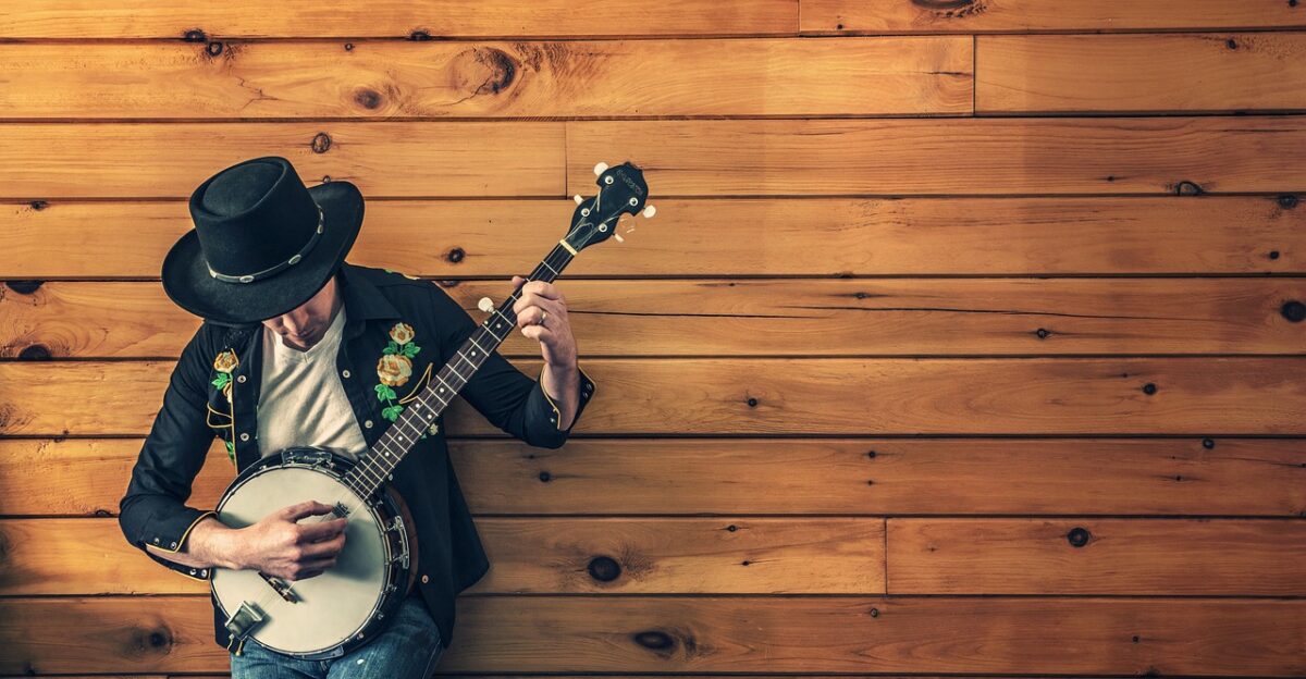 musician country song banjo guitar cowboy country music acoustic guitar musical instrument instrument music musical guitarist jeans hat music music music music music