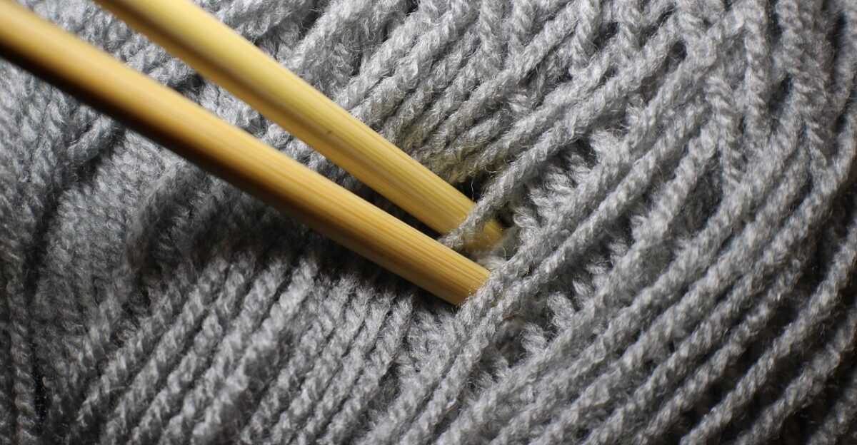 knitting needle knit handwork hobby needle wool gray