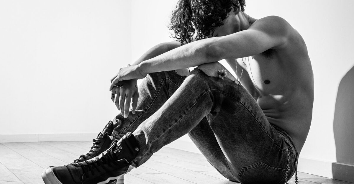 lonely man sitting resting shirtless skin alone body jeans denim pants sneakers fashion men s fashion portrait black and white young man model modeling pose posing monochrome man man man man man alone