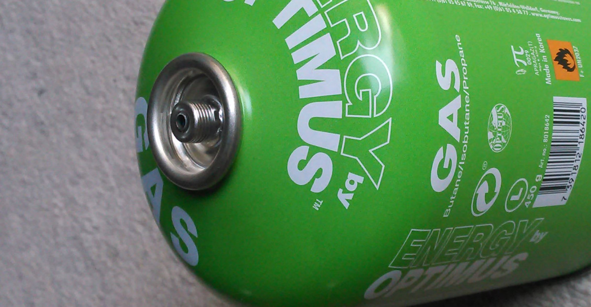 A 450 g gas cylinder containing a mixture of butane isobutane and propane Optimus brand used mainly as a fuel for camping stoves