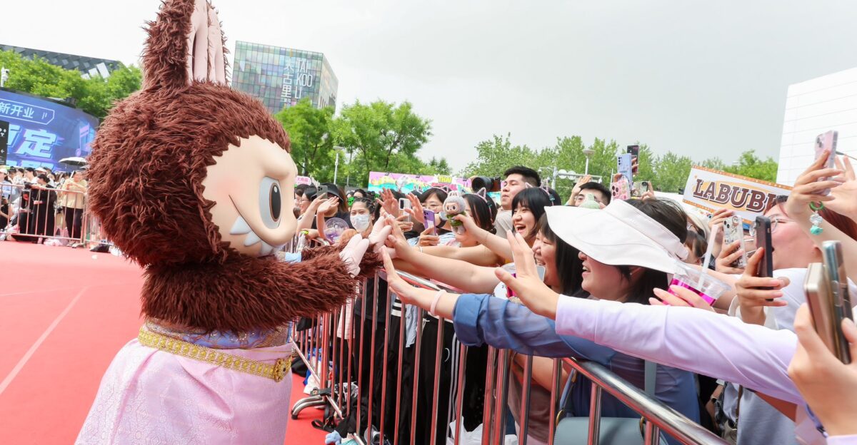 POP MART on X LABUBU wearing a traditional Thai clothing made