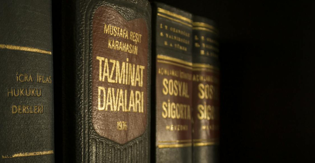Detailed close-up of law and regulation books on a bookshelf emphasizing education and knowledge