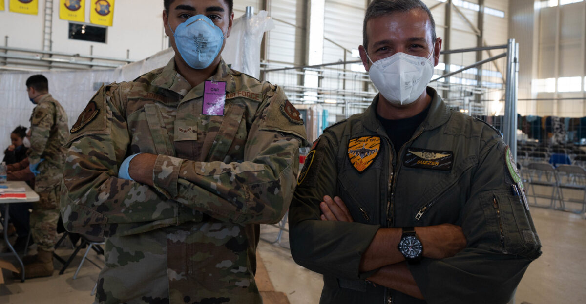 Members of NATO pose for a photo at Ramstein Air Base Germany Sept 3 2021 NATO personnel are supporting Operation Allies Refuge by assisting the 521st Air Mobility Operations Wing with outbound processing U S Air Force photo by Senior Airman Taylor Slater