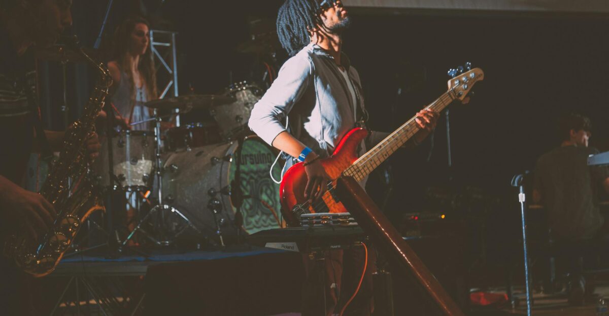 Dynamic live band performance featuring instruments and musicians on stage