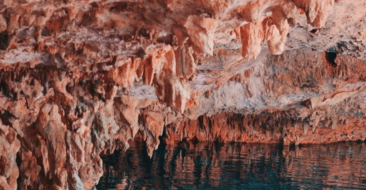 Explore the breathtaking limestone formations and clear waters in a Mexican cave