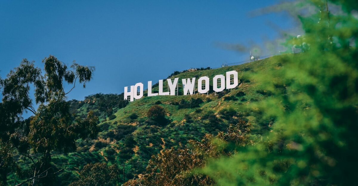 A scenic view of the famous Hollywood sign on a sunny day in Los Angeles