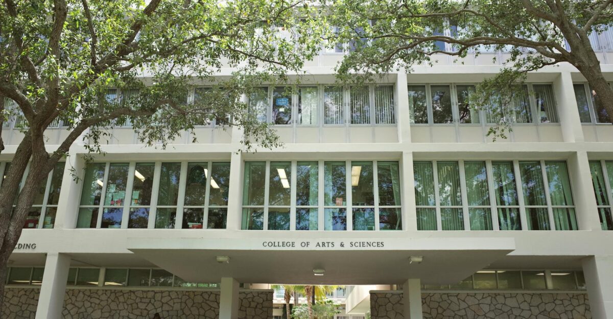 College of Arts Sciences building at University of Miami surrounded by lush trees