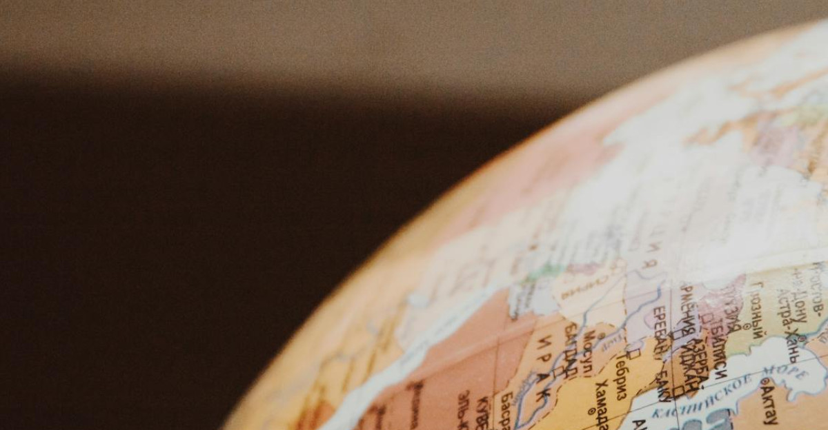 Detailed close-up of a globe showcasing parts of Europe and Asia for world exploration concepts