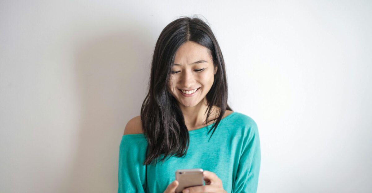 Photo of Woman Using Mobile Phone Free Stock Photo