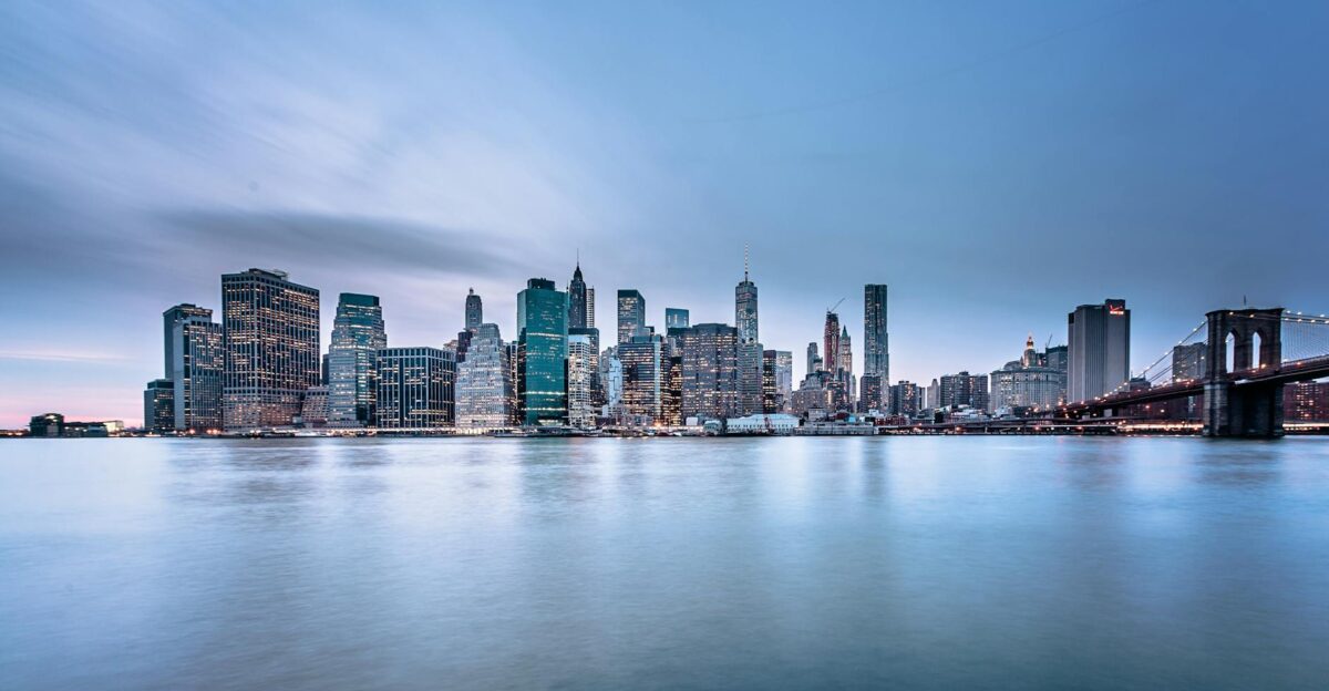 Stunning view of the New York City skyline and Brooklyn Bridge at dusk