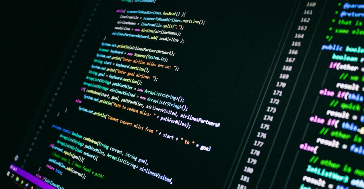 Close-up of colorful programming code on a computer screen showcasing digital technology