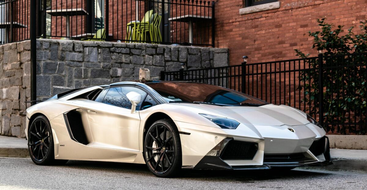 Elegant white sports car parked on a city street in Atlanta showcasing luxury design