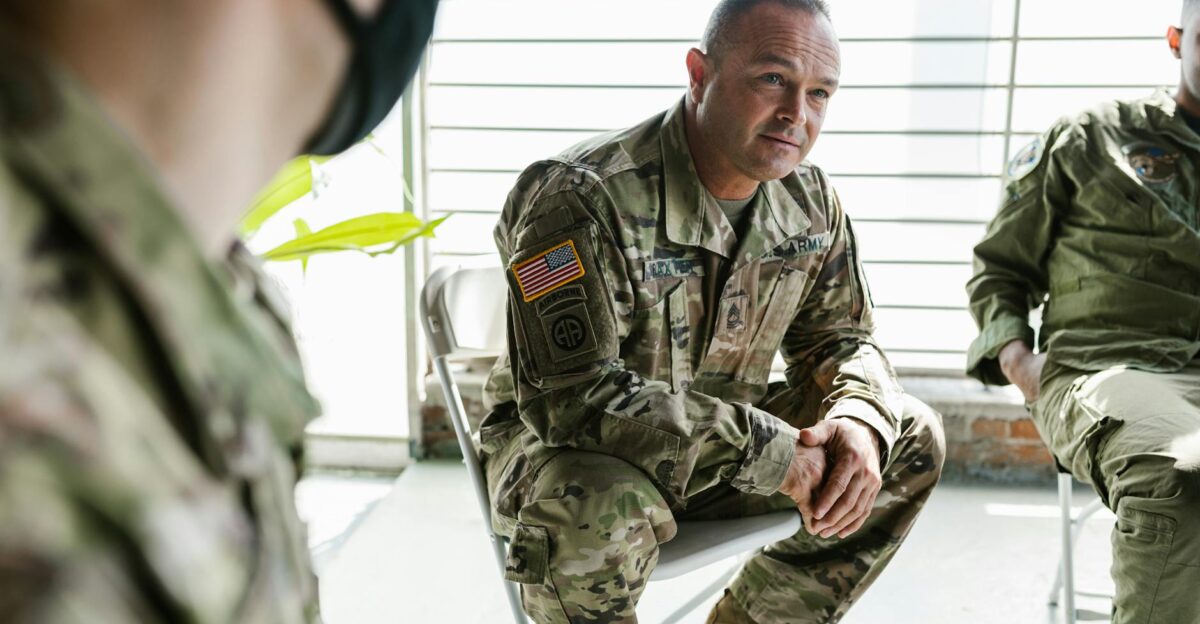 Military veterans participate in a group therapy session to support mental health recovery