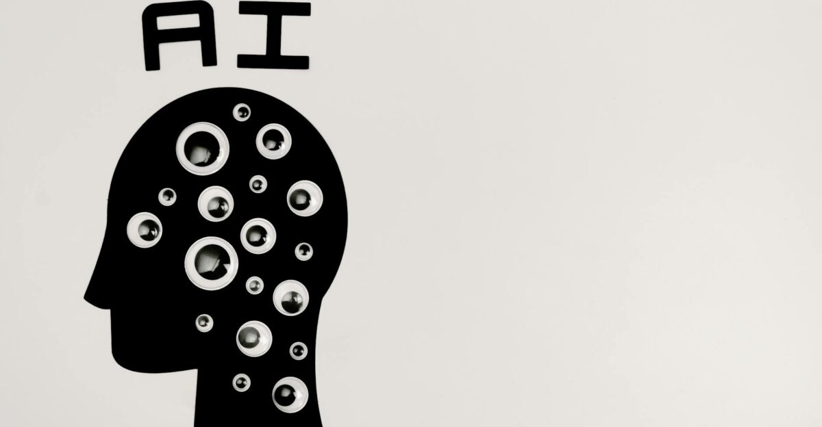 Abstract illustration of AI with silhouette head full of eyes symbolizing observation and technology