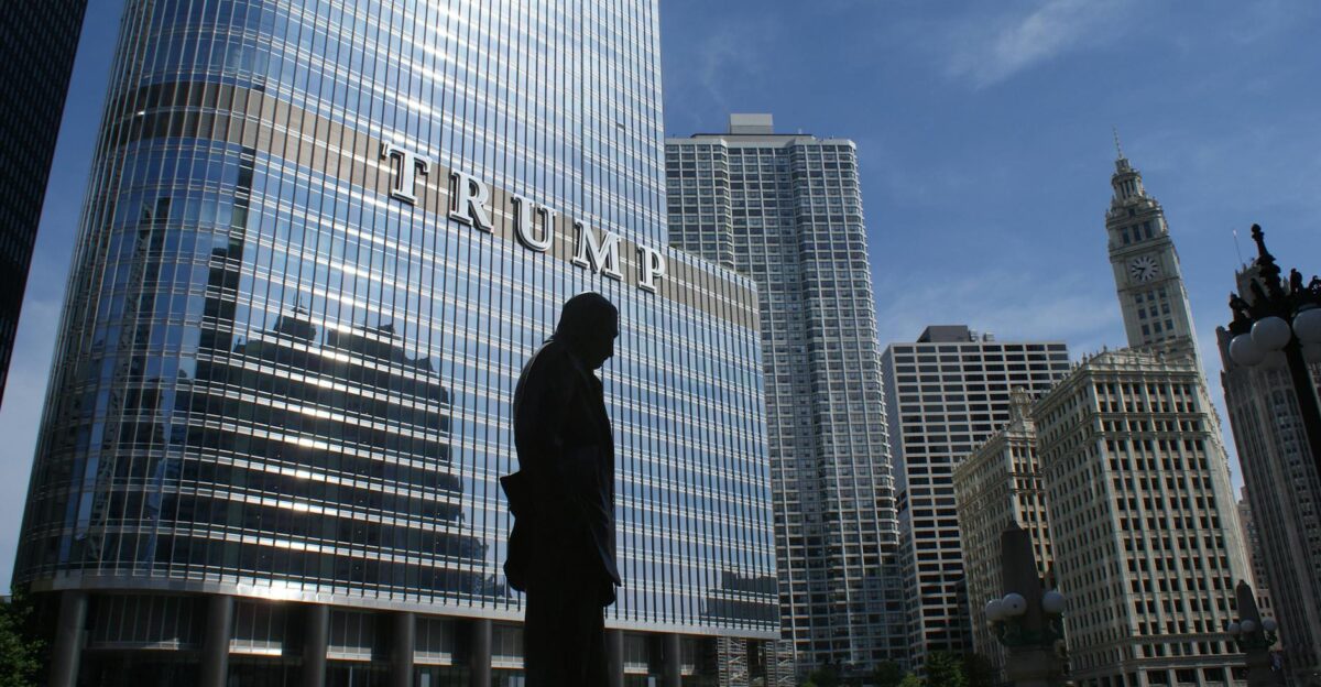 Captivating view of Chicago skyline with Trump Tower reflections and a silhouette in daylight