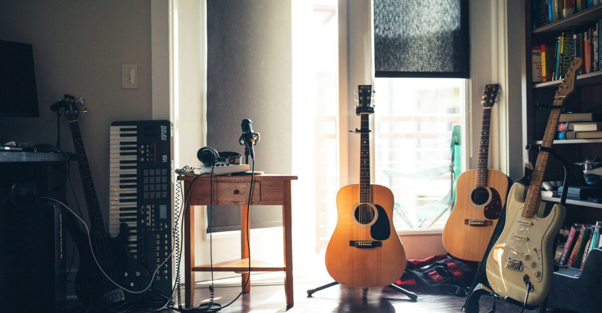 several guitars beside of side table
