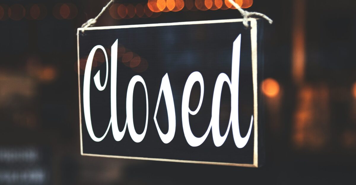 bokeh photography of closed signage