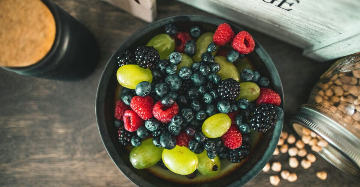 assorted fruits on gray metal bowl