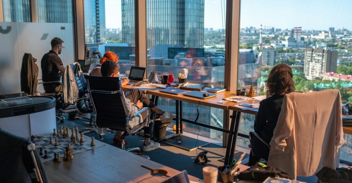 person sitting beside table