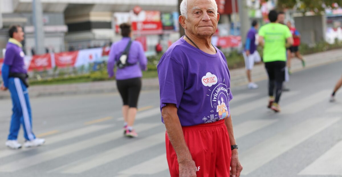 man in purple and white printed crew-neck t-shirt