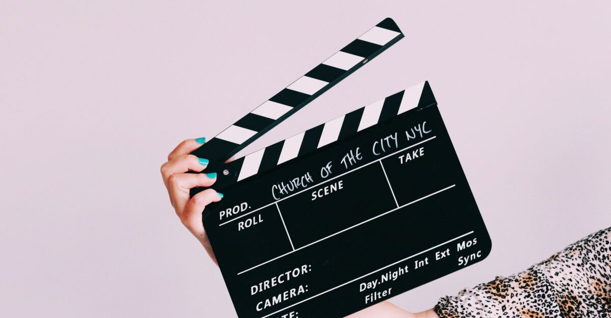 person holding black and white quote board