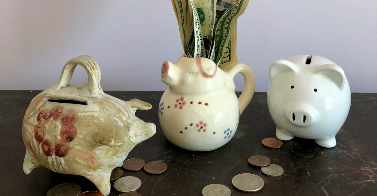 white ceramic teapot beside white ceramic teapot