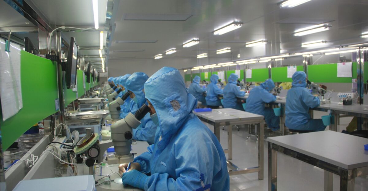 man in blue jacket wearing blue mask