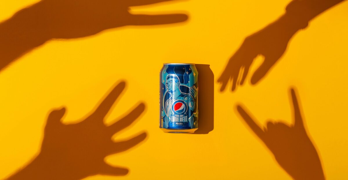 yellow and white labeled can