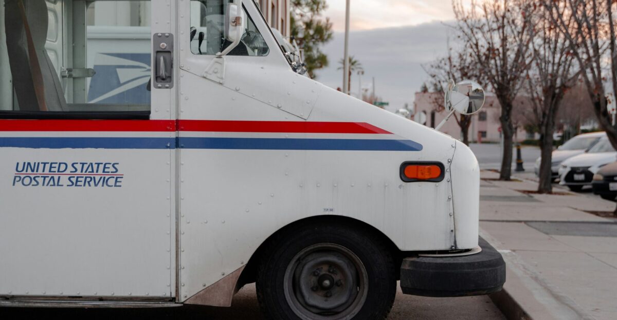 white van on the road during daytime