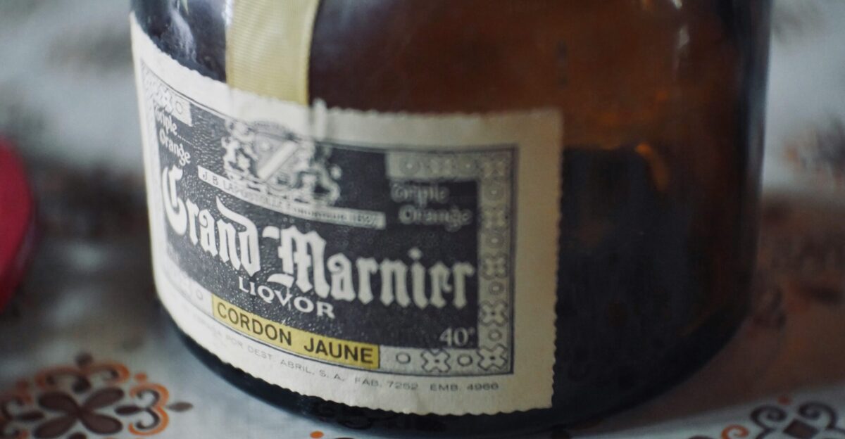 a close up of a bottle of beer on a table