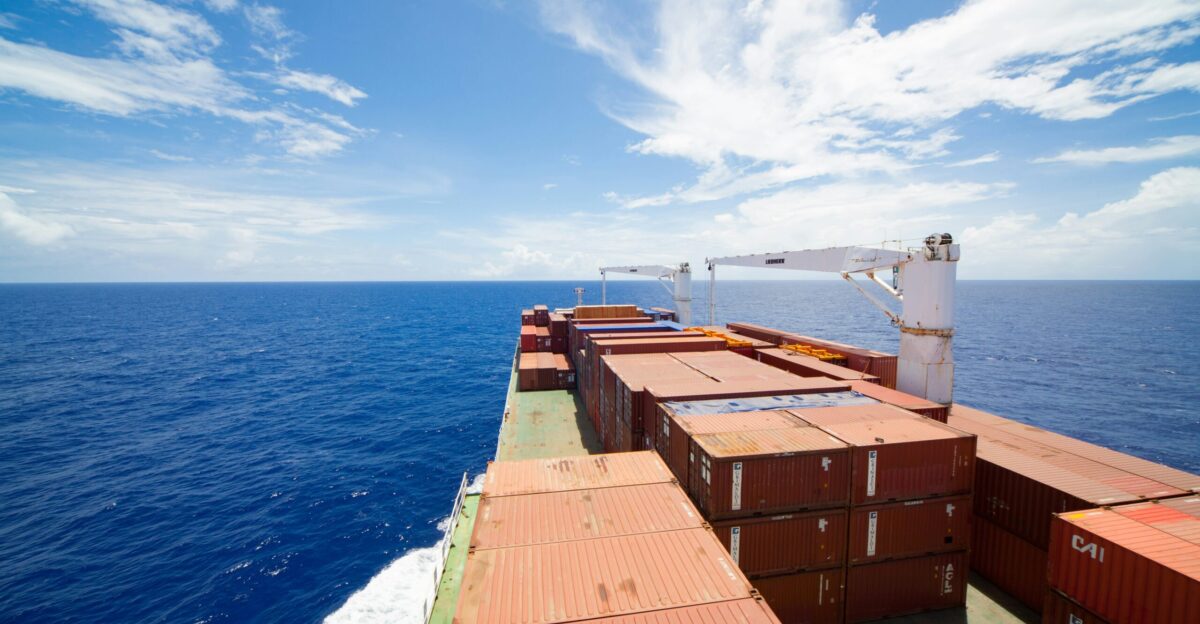 brown wooden dock on blue sea under blue sky during daytime