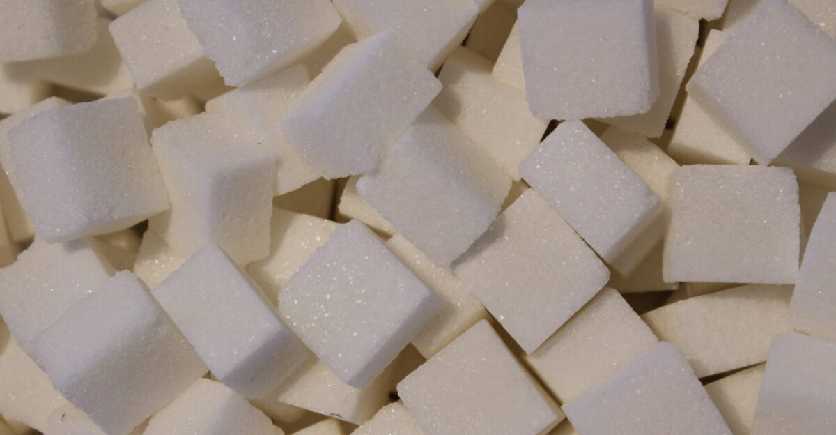 a pile of white sugar cubes sitting on top of a table