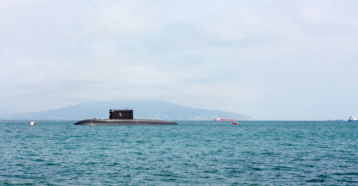 a submarine floating on top of a large body of water