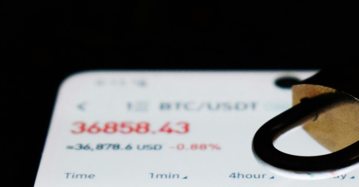 a close up of a business card with a stock chart on it