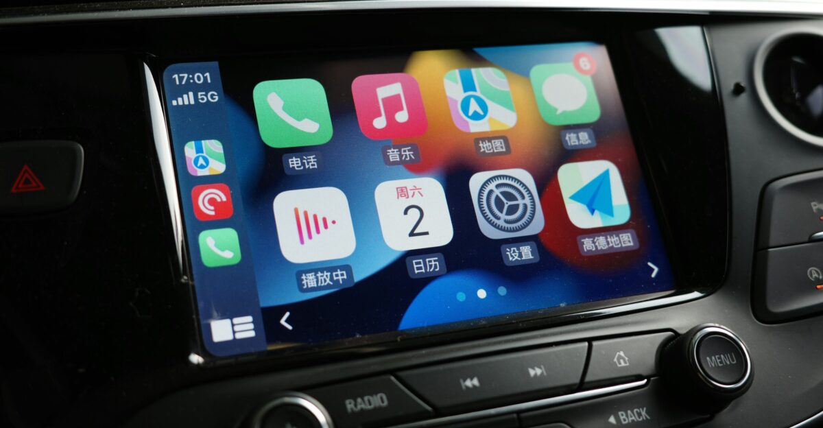 a car dashboard with various app icons on it