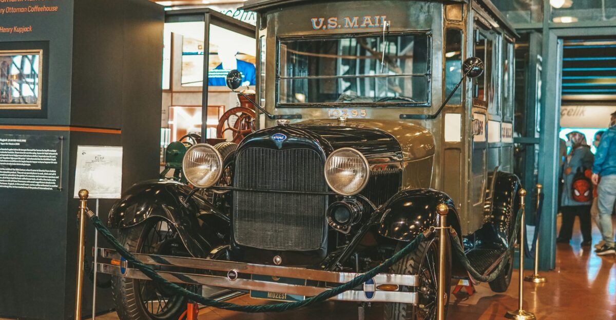 an antique car on display in a museum