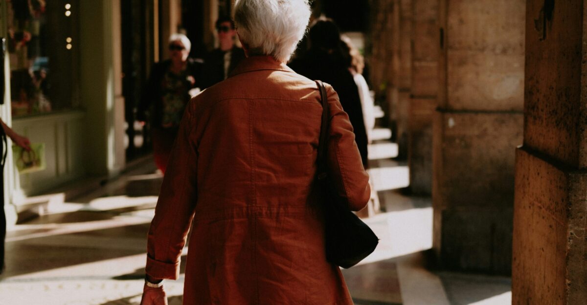 a person walking down a sidewalk