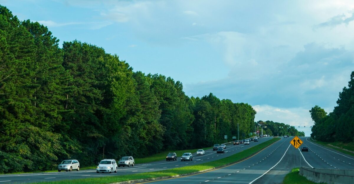 a highway with cars on it