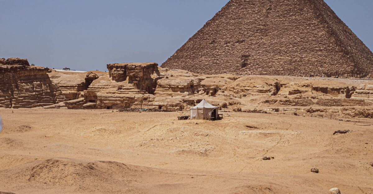 a group of pyramids in a desert
