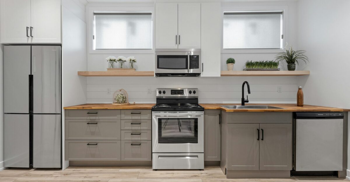 a kitchen with white cabinets