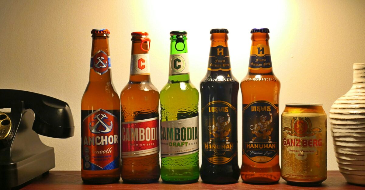 a number of different types of beer on a table