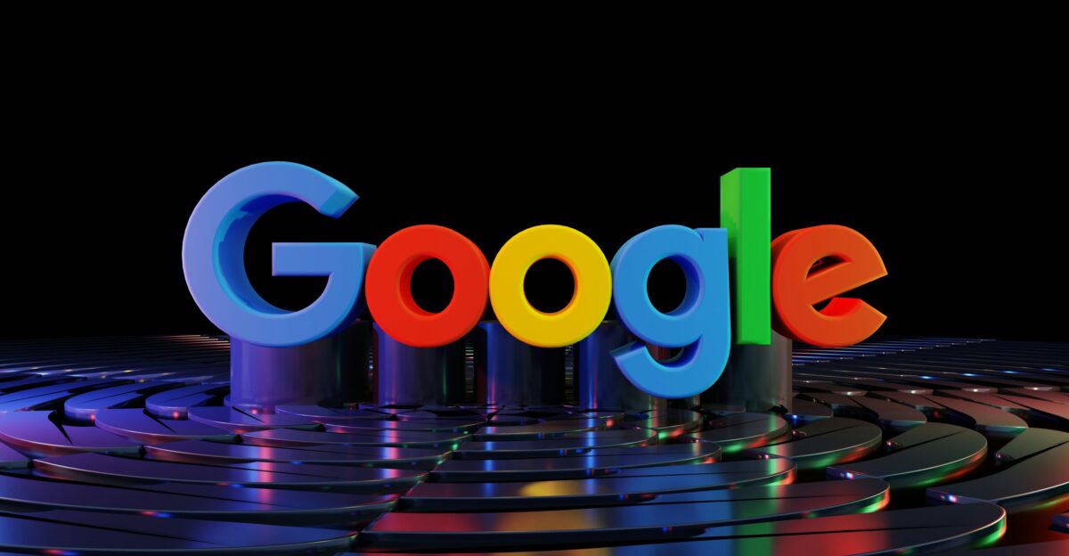the google logo is displayed in front of a black background